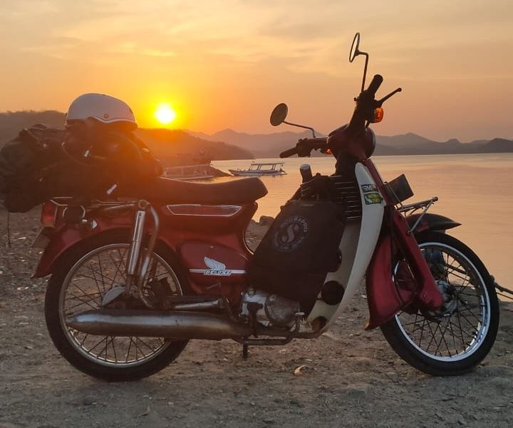 Ride a scooter to Tembowong harbor for boat transfer to Gili Gede